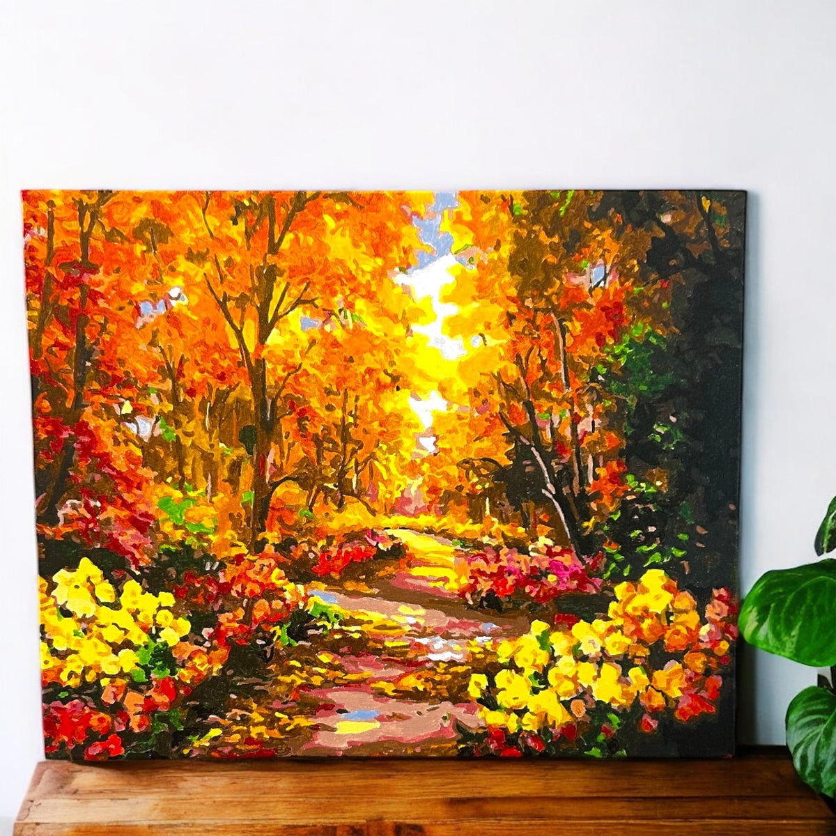 Autumn Forest Path paint by numbers canvas mocked up in a reading corner