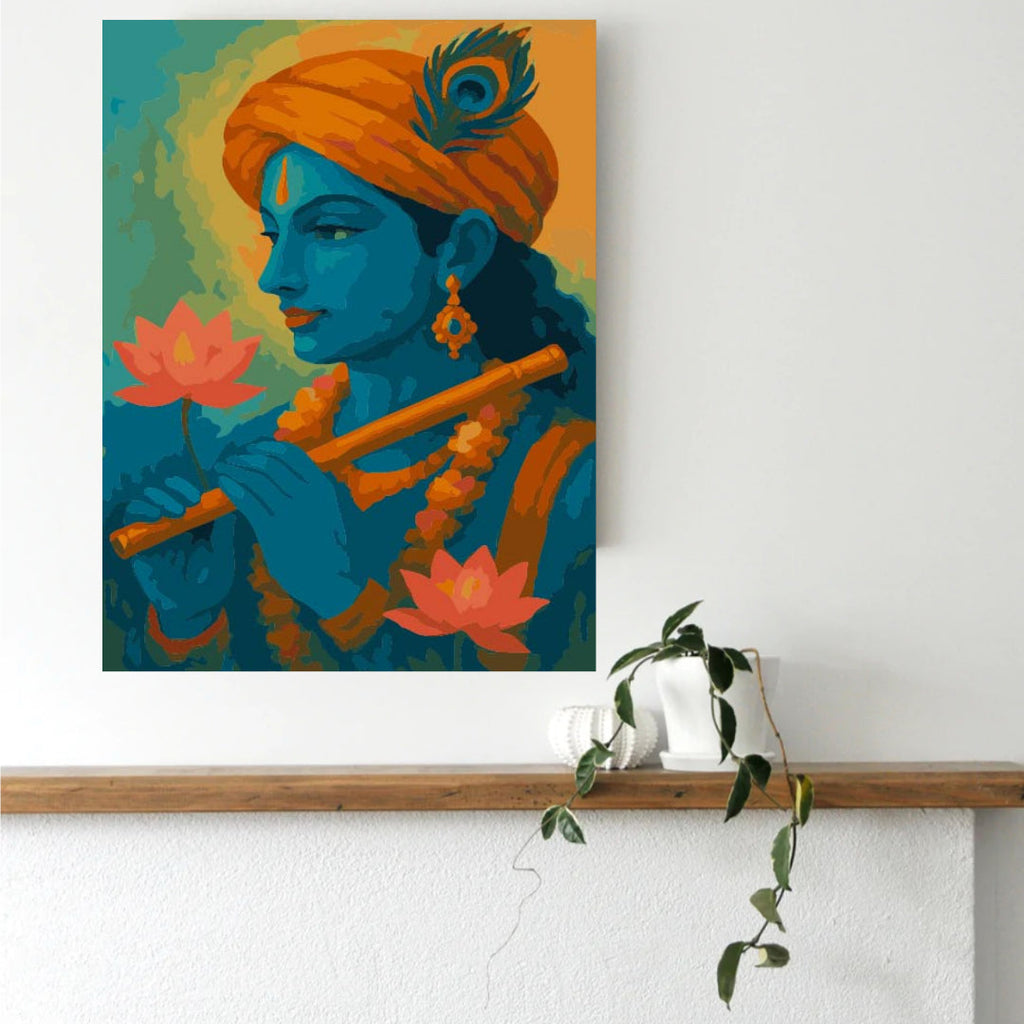 Framed Krishna paint by numbers canvas hung above a console table