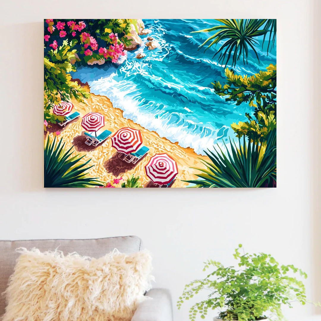 Framed beach cove paint by numbers canvas displayed above a sofa